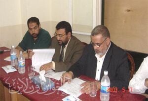 د. الشاعر ود. الخولاني في الندوة.jpg